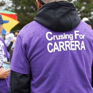 A cruising for Carrera sign