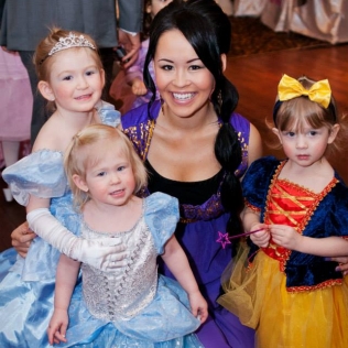 A princess with 3 toddler princesses