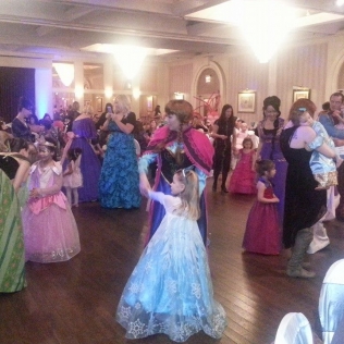 young princesses and their mothers dancing
