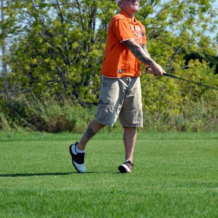 a golfer looking into the air