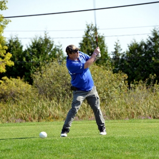 a golfer making his shot