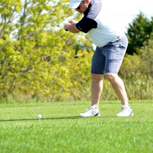 a golfer about to swing