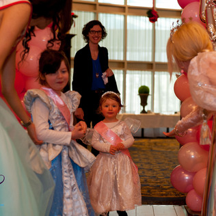 Two toddler princesses saying goodbye to the princesses